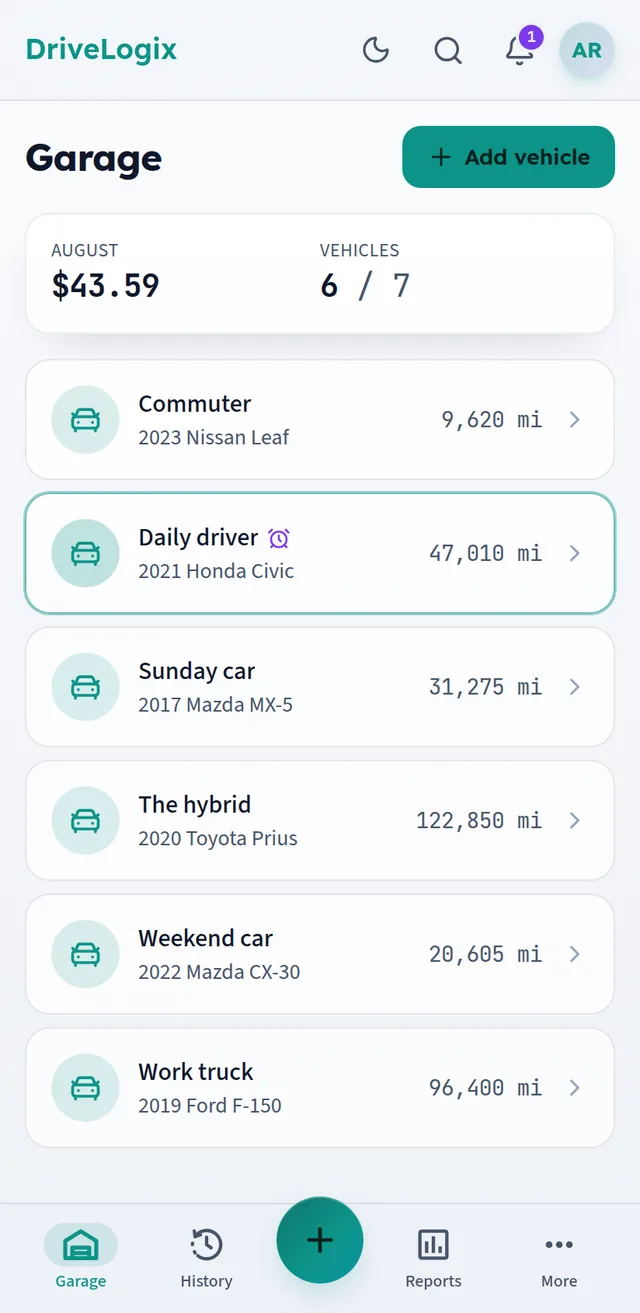 Garage screen listing six vehicles with their current odometer readings, and this month's spending across all of them